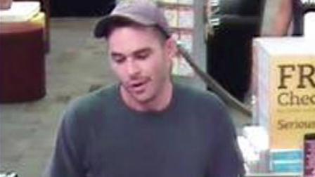 A man suspected of robbing the TCF Bank on Roberts Road in Hickory Hills, Thursday, July 26, 2012, is seen in this surveillance image. Jeffrey Kaplan was charged in a criminal complaint filed in U.S. District Court in Chicago on August 1.