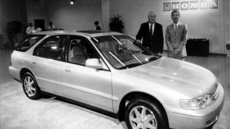 Thomas G. Elliott, Executive Vice President of American Honda Motor Co., left, and Koichi Amemiya, President, pose beside a 1994 Honda Accord introduced at a news conference Wednesday, Sept. 1, 1993, at the companys Marysville, Ohio, manufacturing plant. (AP)