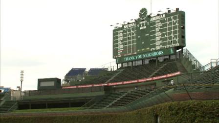 The Cubs held an open house for Wrigleyville residents Saturday, giving out free food and drinks, and even let people play catch on Wrigley Field.