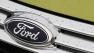 In this file photo  raindrops are on the grill of a  2012 Ford Fiesta SE at the Maroone Ford of Miami dealership.       (AP Photo/Wilfredo Lee/file)