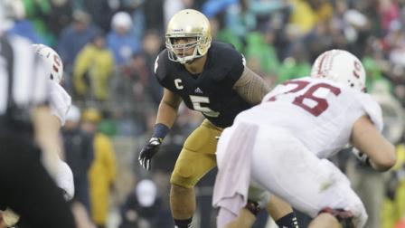 Notre Dame linebacker Manti Teo (5) watches Stanford players during the first half of an NCAA college football game in South Bend, Ind., Saturday, Oct. 13, 2012. (AP Photo/Nam Y. Huh)