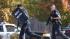 Police and swat team members respond to a call...