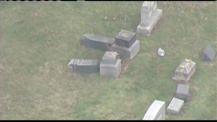 Police in far south suburban Monee are looking for suspects who vandalized dozens of cemetery tombstones over the weekend.