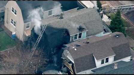 A 50-year-old man and at least 12 dogs were rescued from a fire on Chicagos Northwest Side, Monday, Nov. 26, 2012.
