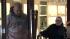 Police say three men busted into the Jimmy Choo...