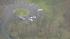 Authorities searched for the two escapees in a...