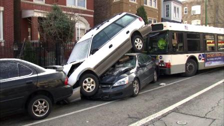 A CTA bus crashed into about 20 parked cars after the driver lost consciousness, Friday, Dec. 21, 2012.