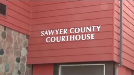 The Sawyer County Courthouse is seen in this image.