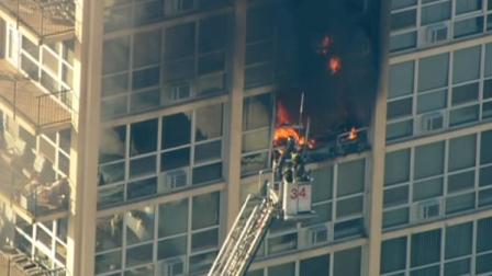 Fire crews responded Tuesday to the scene of a fire burning on the eighth floor of a South Shore high-rise building.