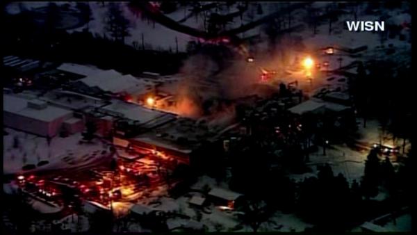 Fire crews battled a major blaze at a food plant about 75 miles north of Chicago in Burlington, Wisconsin, Thursday, January 31, 2013.