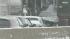 At least two dozen vehicles were involved in a...