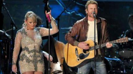 Recording artists Miranda Lambert, left, and Dierks Bentley perform at the 55th annual Grammy Awards in Los Angeles.