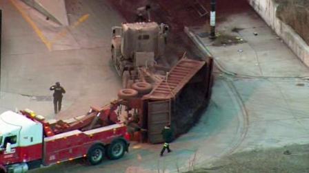 Crews had quite a mess to clean up early Thursday morning when a dump truck rolled and lost its load at 130th and Indiana on the Far South Side.