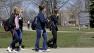 Students make their way to classes after a lockdown was lifted at Carroll University in Waukesha, Wisconsin, Tuesday, April 16, 2013.  (AP Photo/Morry Gash)