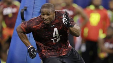 Florida linebacker Jonathan Bostic runs a drill at the NFL football scouting combine in Indianapolis, Monday, Feb. 25, 2013. The Chicago Bears selected Bostic in the second round of the 2013 NFL Draft. (AP Photo/Michael Conroy)