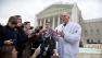 Vernon Hugh Bowman, a 75-year-old Indiana soybean farmer, speaks with reporters outside the Supreme Court in Washington.  (AP Photo/J. Scott Applewhite)