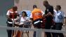An Israeli woman is taken out of a bank in the town of Beersheba.
