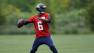Seattle Seahawks backup quarterback Josh Portis passes during an NFL football organized team activity workout in Renton, Wash.