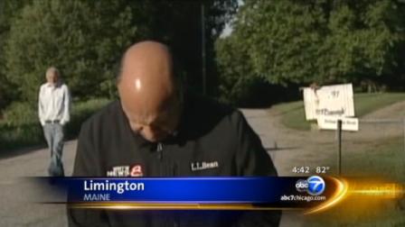 Missing man Robert McDonough can be seen walking up behind the TV reporter in Limington, Maine.