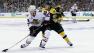 Boston Bruins defenseman Torey Krug (47) checks Chicago Blackhawks right wing Ben Smith (28) during the first period in Game 3 of the NHL hockey Stanley Cup Finals in Boston.