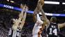 Miami Heat shooting guard Dwyane Wade (3) looks to pass under pressure from San Antonio Spurs point guard Gary Neal (14), Manu Ginobili and center Tiago Splitter (22) of Brazil during the first half of Game 6 of the NBA Finals basketball game.