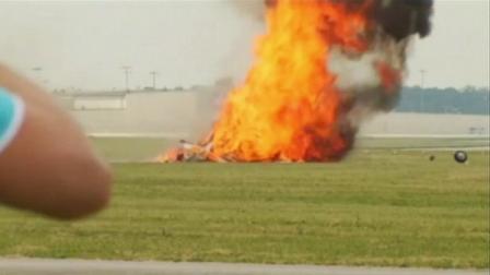 A plane carrying a wing walker crashed Saturday at an air show and exploded into flames, killing the pilot and stunt walker instantly, authorities said.