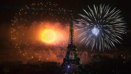 Fireworks illuminate the Eiffel Tower in Paris during Bastille Day celebrations late Sunday, July 14, 2013. (AP Photo/Thibault Camus)