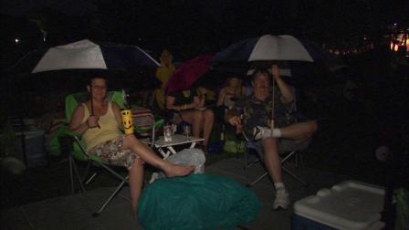 At Ravinia in Highland Park, Sheryl Crow performed. Fans in the pavilion were protected, but everyone camping out on the lawn got drenched.