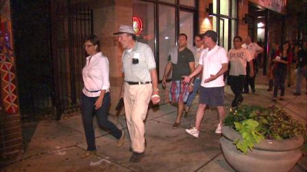Residents in Lakeview came together overnight Friday for a community walk  to spread the word about stopping the violence on the North Side.