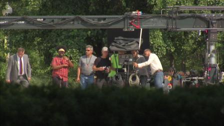 Expect random street and sidewalk closures to continue around Grant Park until about 11 Sunday night so that film crews can get the shots they need for the Transformers sequel.