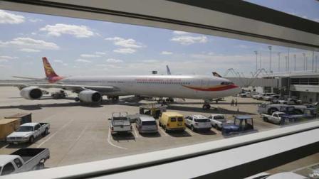 The inaugural flight of Chinas Hainan Airlines arrives at OHare International Airport from Beijing Tuesday Sept. 3, 2013 in Chicago. (AP Photo/M. Spencer Green)