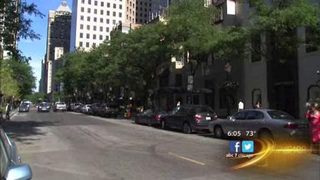 Police say a group of smash-and-grab burglars have hit two stores in the North Michigan Avenue area.