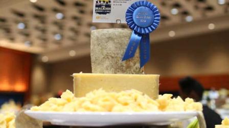 Photo of a blue ribbon cheese from http://www.cheesesociety.org.