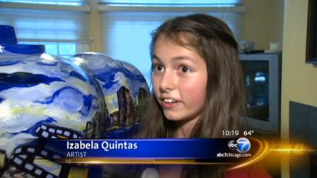 Izabel Quintas and the fire hydrant she painted for display in Chicago