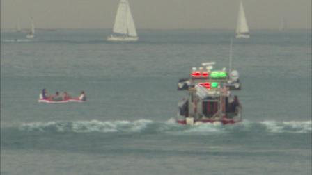 A man on a Jet Ski ran out of fuel and becomes stranded on Lake Michigan before being rescued.
