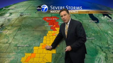 A storm system that buried parts of Wyoming and South Dakota in heavy, wet snow on Friday also brought powerful thunderstorms and possible tornadoes to the Great Plains.