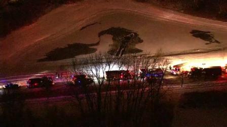 Two people were rescued after a car plunged into an icy pond in south suburban Bolingbrook, police said.