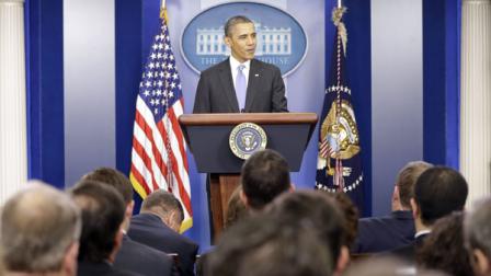 FILE: President Barack Obama speaks during an end-of-the year news conference in the Brady Press Briefing Room at the White House in Washington