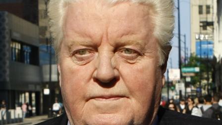 In this May 24, 2010 file photo, former Chicago police Lt. Jon Burge leaves the Federal Courthouse after the first day of jury selection in his obstruction of justice and perjury trial. (AP Photo/Charles Rex Arbogast, File)