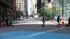 Pedestrians are crossing the street using the...