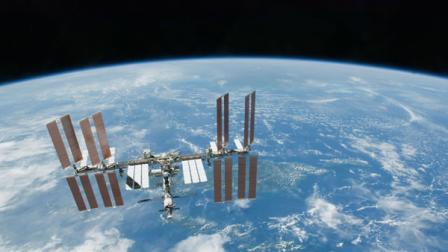 File photo provided by NASA shows the International Space Station with Earths horizon as a backdrop.