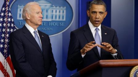 President Barack Obama and Vice President Joe Biden make a statement regarding the passage of the fiscal cliff bill in the Brady Press Briefing Room at the White House in Washington.