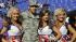 Army Pfc. Rodney Thompson, second from left,...