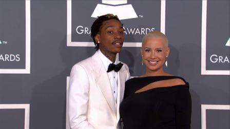 A pregnant Amber Rose and fiance Wiz Khalifa attend the 2013 Grammy Awards