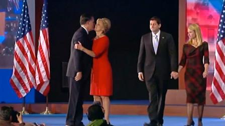 Republican presidential candidate Mitt Romney is seen hugging his wife, Ann, following his concession speech at his election headquarters in Boston