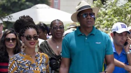 U.S. singer Beyonce and her husband, rapper Jay-Z, hold hands as they tour Old Havana, Cuba.