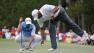 Tiger Woods, right, and Sergio Garcia of Spain are shown on the 12th green during the third round of The Players championship golf tournament at TPC Sawgrass in Ponte Vedra Beach, Fla.