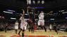 Miami Heat small forward LeBron James (6) heads to the hoop against Chicago Bulls point guard Nate Robinson (2) and Chicago Bulls shooting guard Marco Belinelli (8)