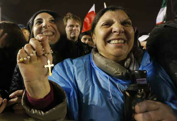 Faithful gather in St. Peters Square at the...