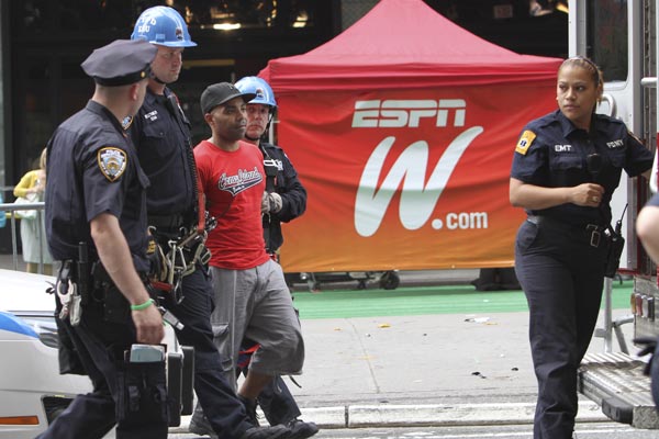 New York City police officers take into custody...